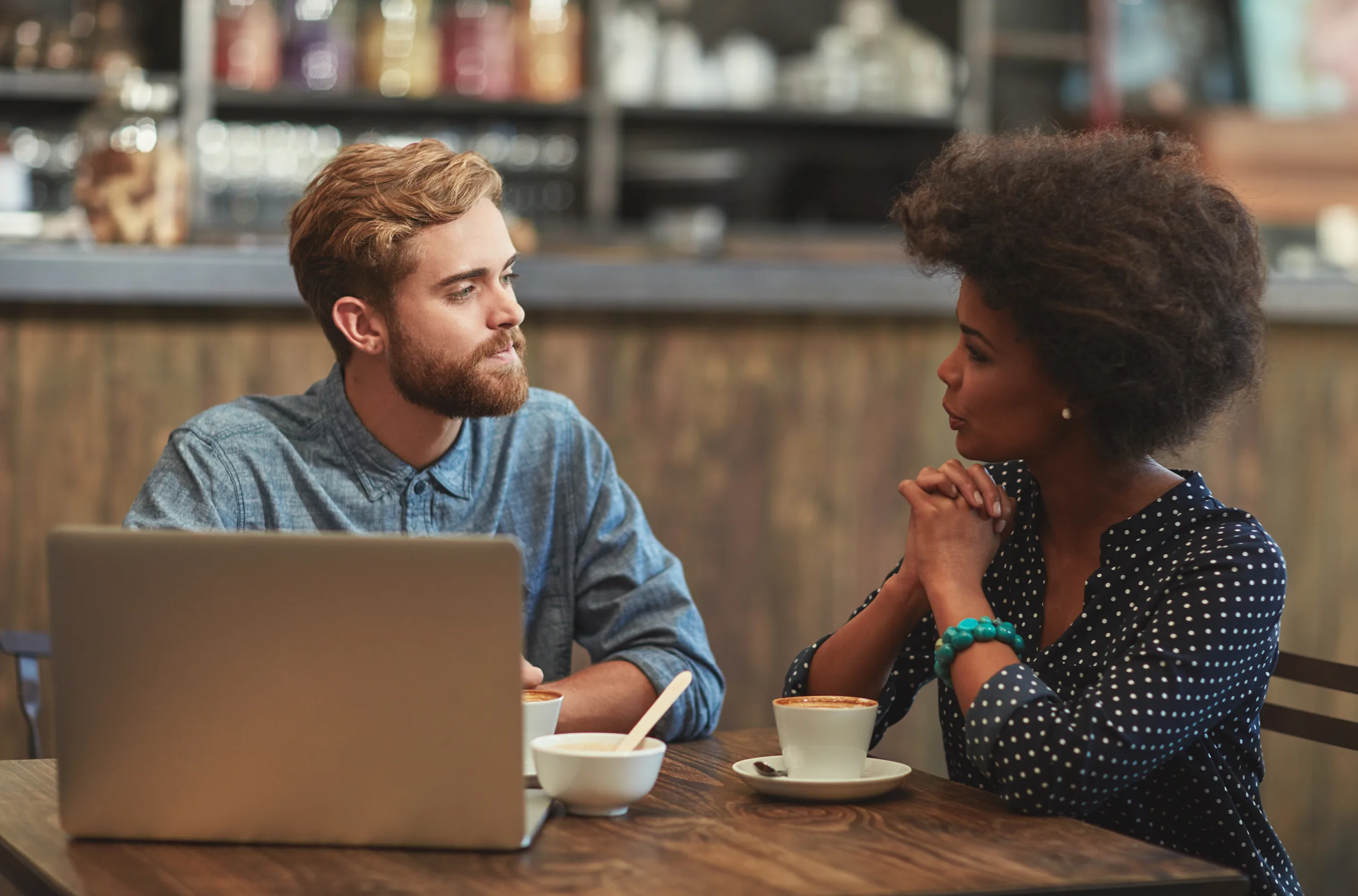 Two people engaged in a meaningful conversation built on trust, listening, and understanding